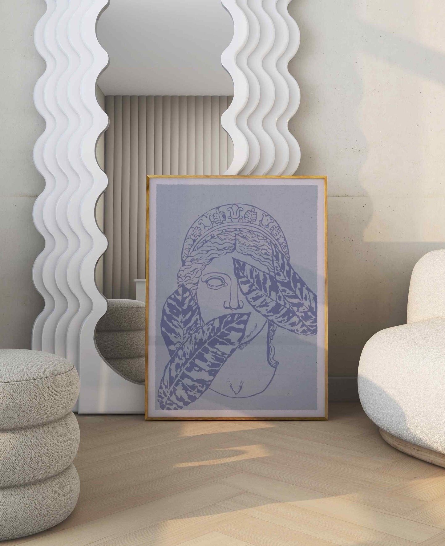 A framed poster in blue shades with an illustration of an antique sculpture of women's face stands in the room