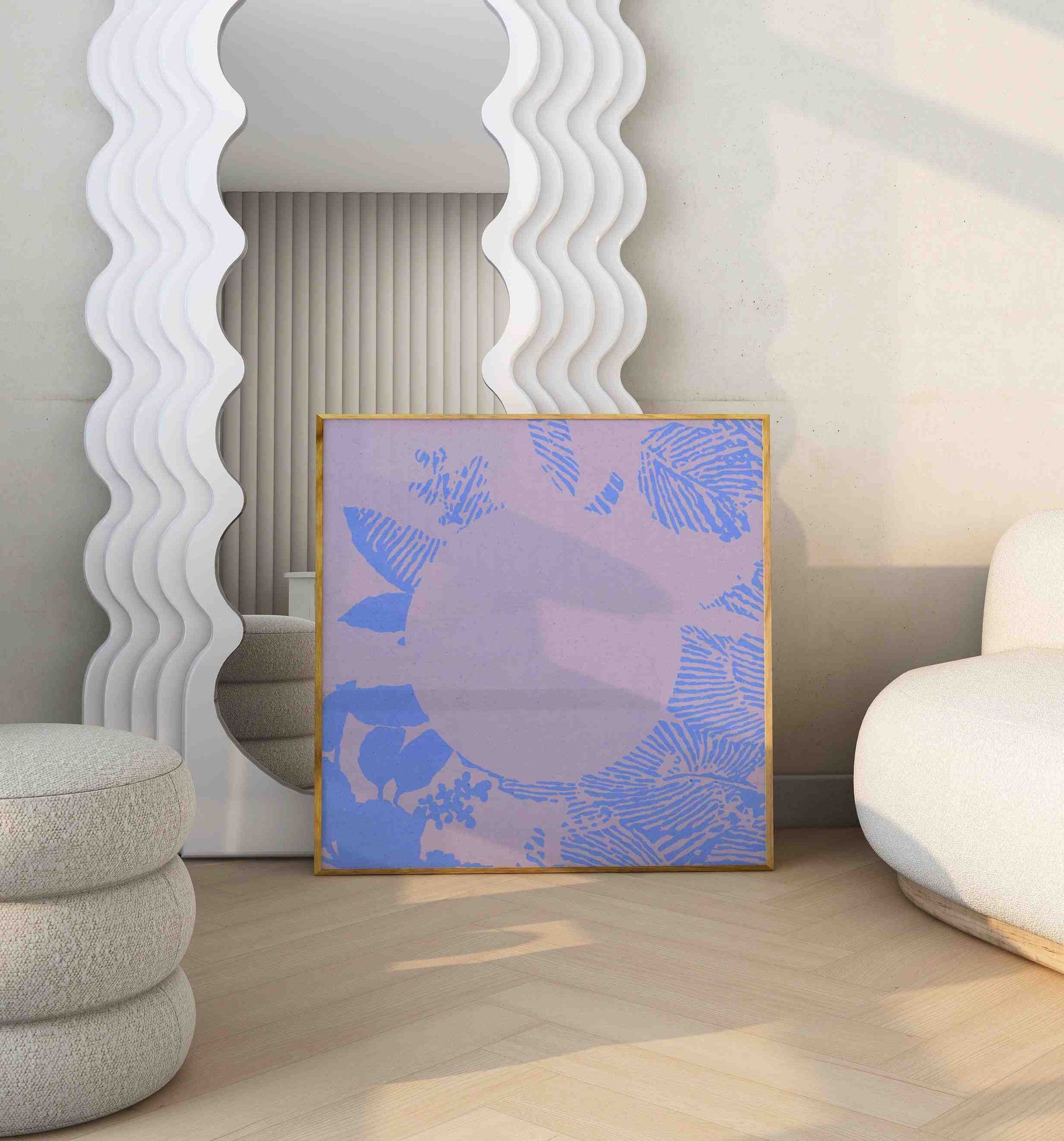 Framed boho poster with a botanical motif in purple and blue colors stands in a modern room