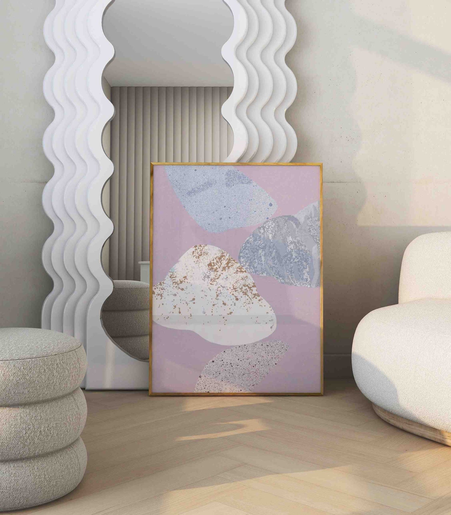 Abstract poster with organic shapes motif stands in a modern bright room.