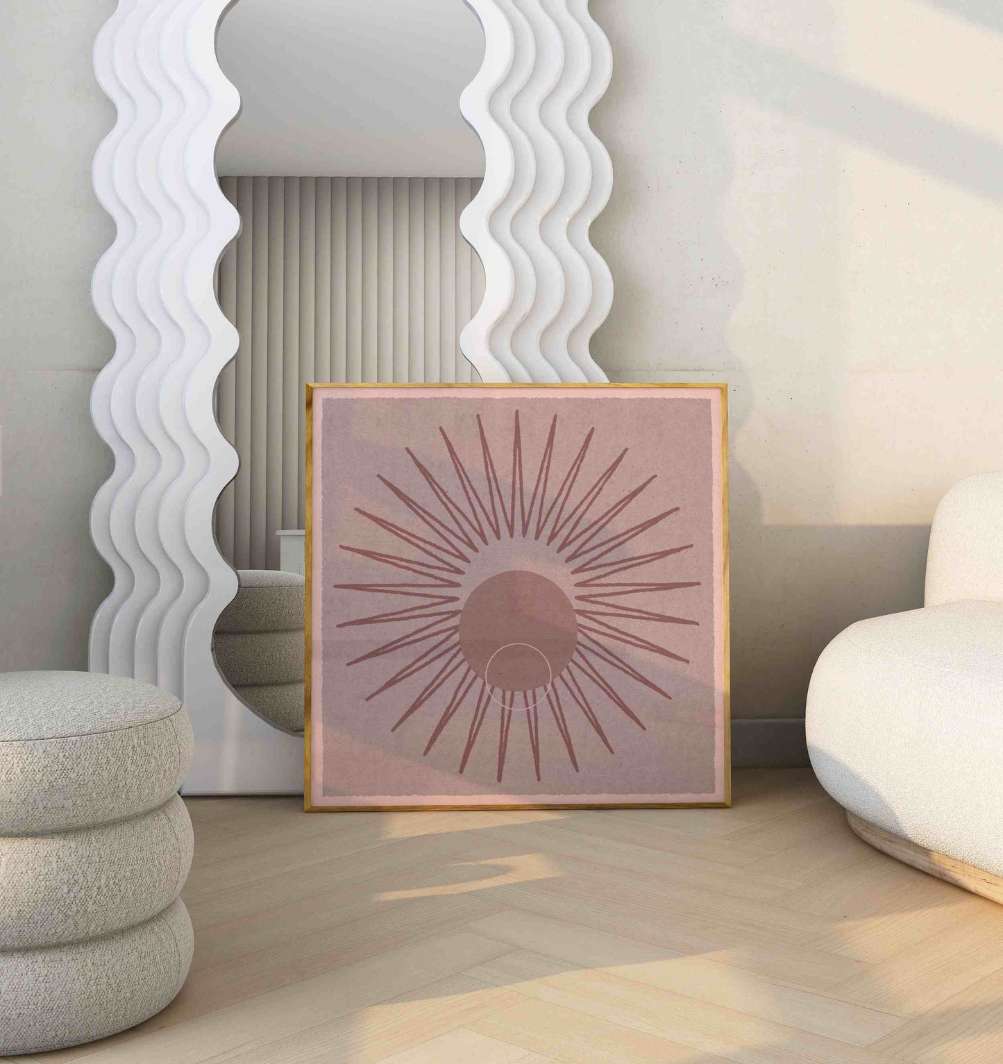 Framed boho poster with a shining sun motif, stands in a room with beige furniture